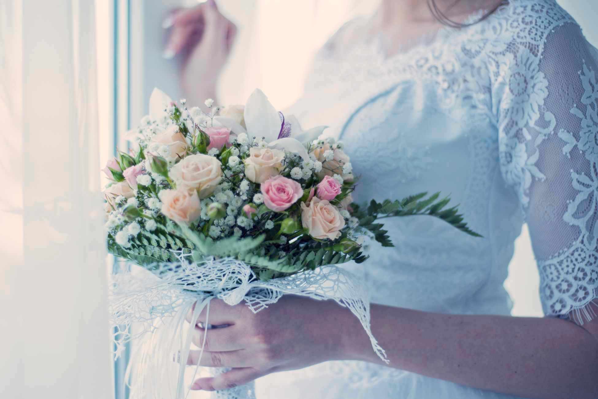 Bride by the Window with Flowers